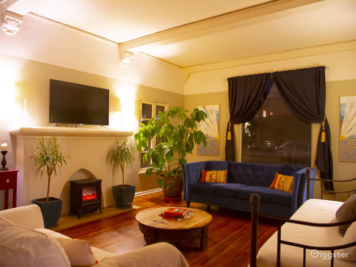 Living Room. TV is on stand-alone base and can simply be pulled down.