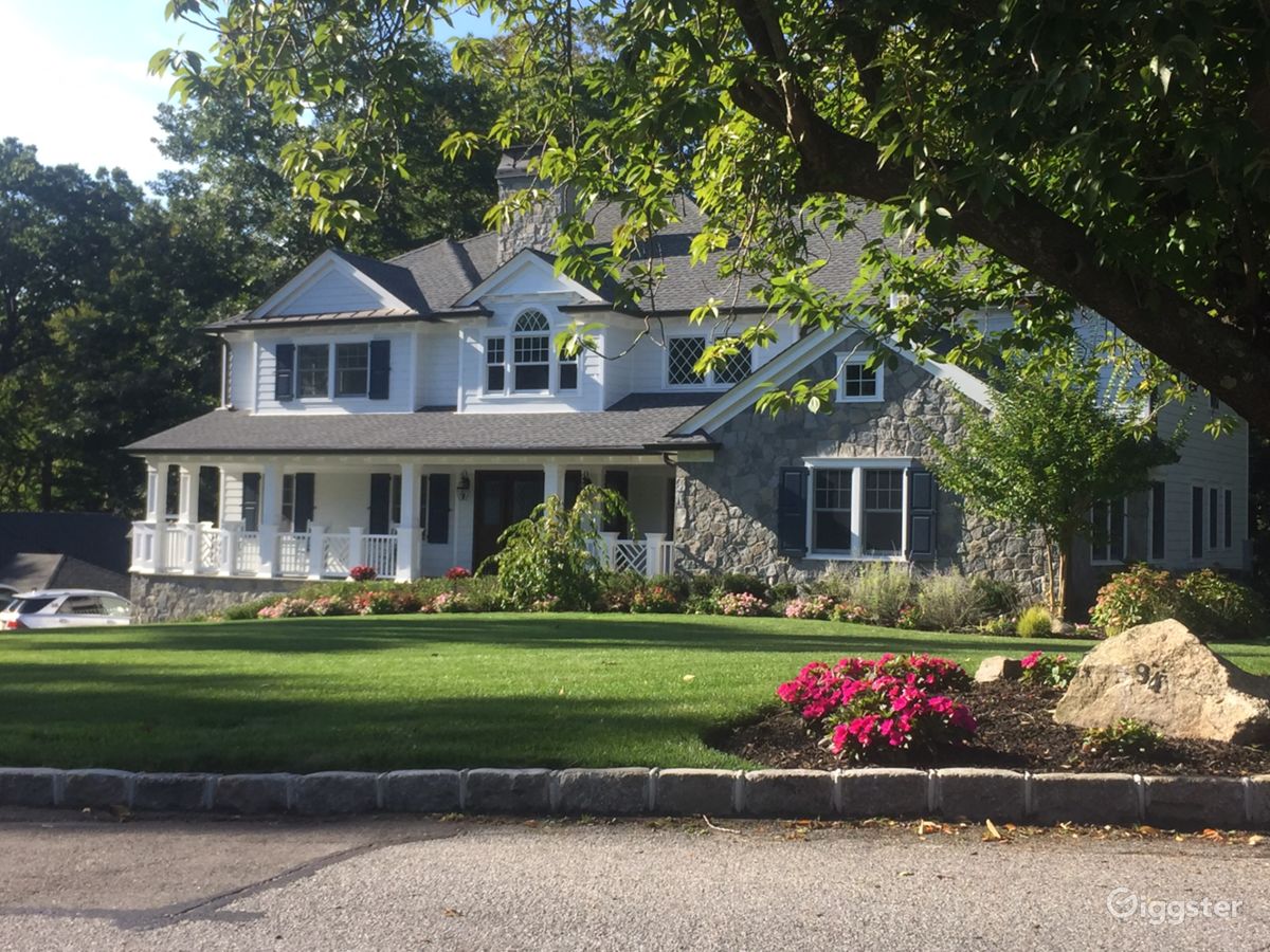 Timeless White Clapboard House with stone features Rent this location