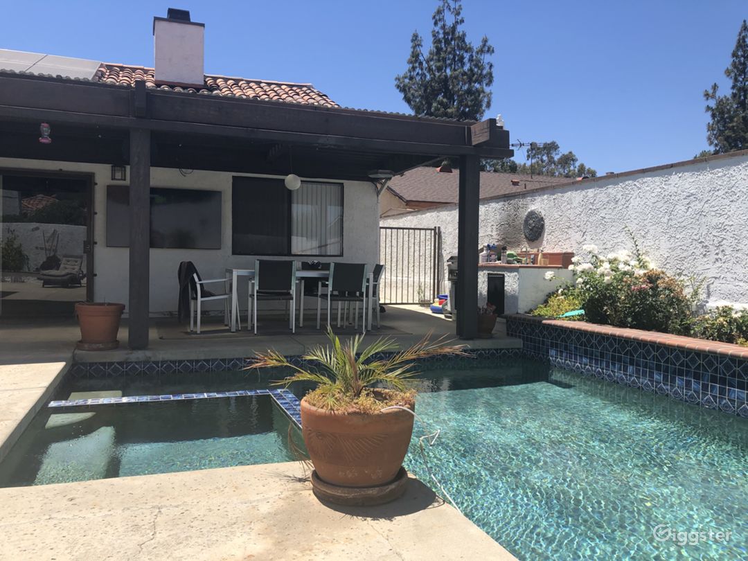 Pool, hot tub, patio with furniture and large tv 