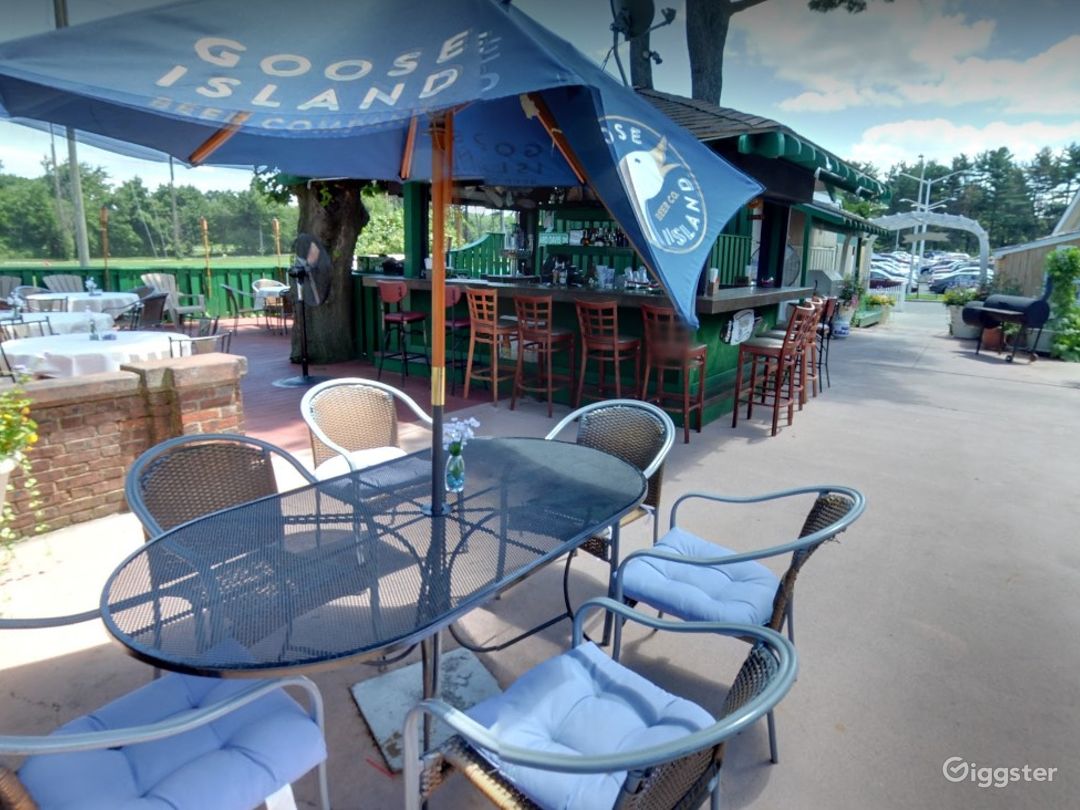 Bright Outdoor Dining Space with Bar in Glen Cove Photo 1