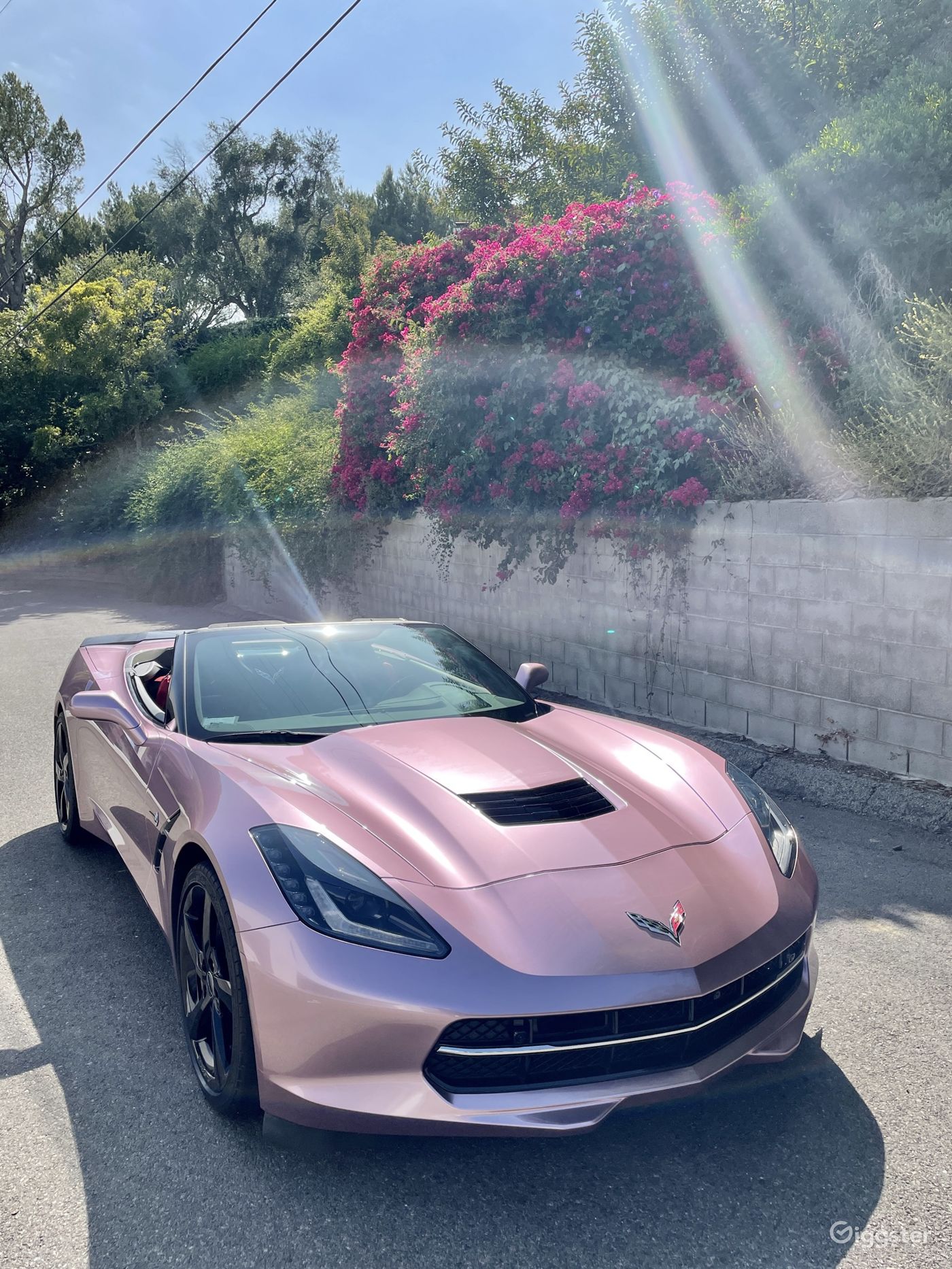 Stunning pink metallic Corvette Cabrio Rent this location on Giggster