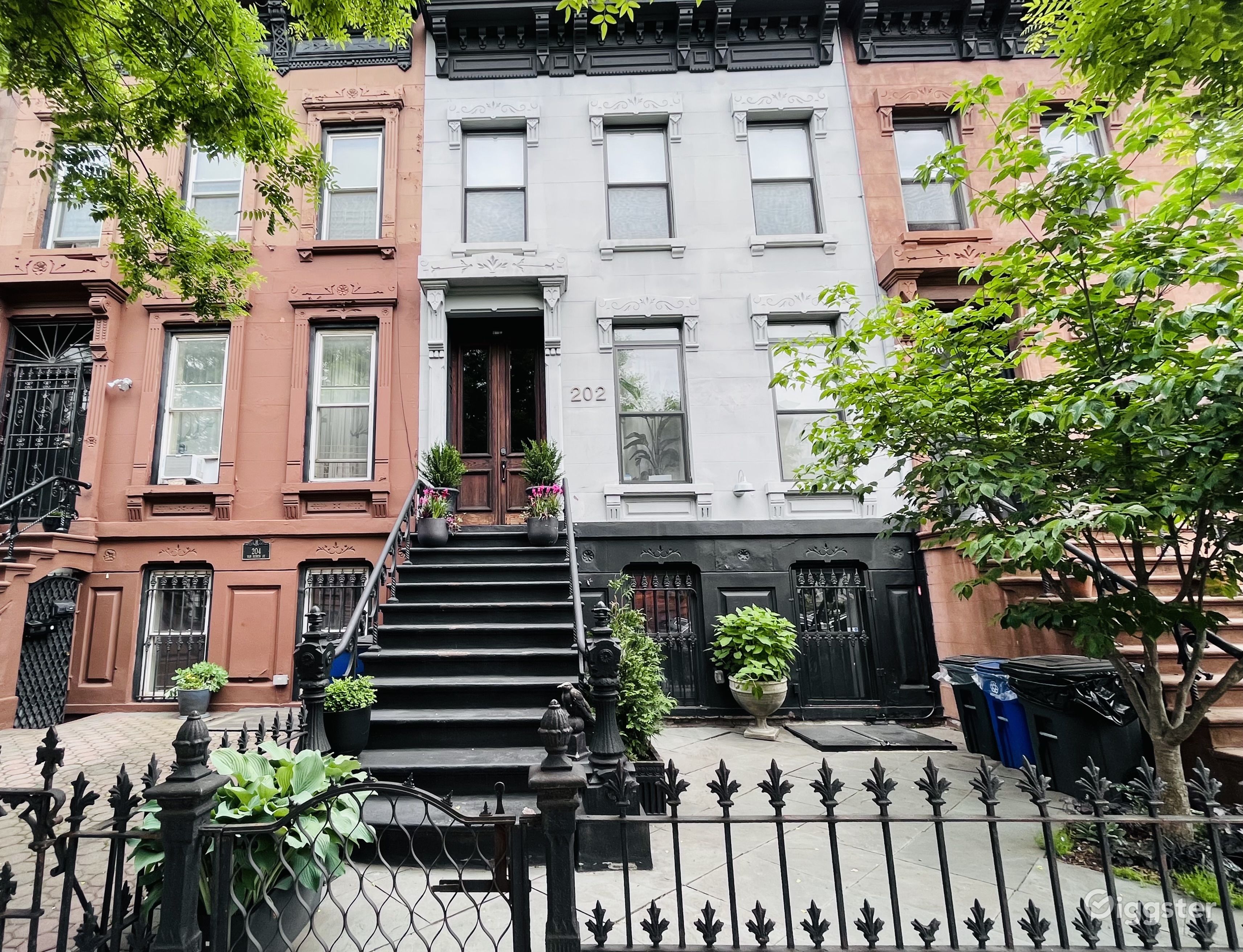 Brownstone with Black Bedroom and Backyard Oasis | Rent this location