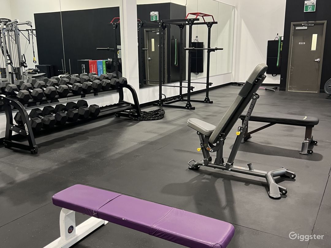 A Large Naturally Lit Industrial Style Gym Photo 2