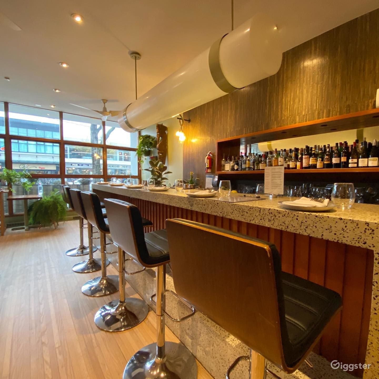 Chic Eatery with a Sleek Bar in Kitsilano Rent this location on Giggster