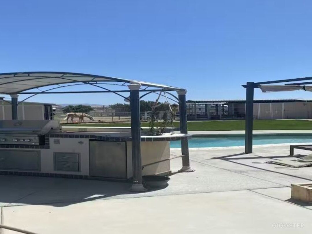 Refreshing Pool with Grassy Area  Photo 4