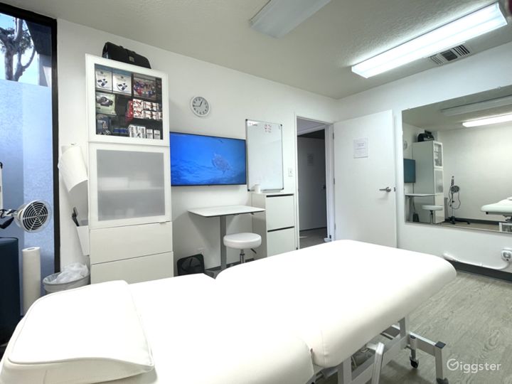 Exam room with TV and mirror