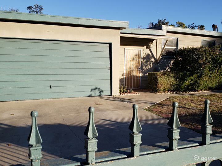 50s Mid Mod with great parking for trucks and trailers for Crew parking abd base camp,.Set Designers Dream house is a blank canvas,..