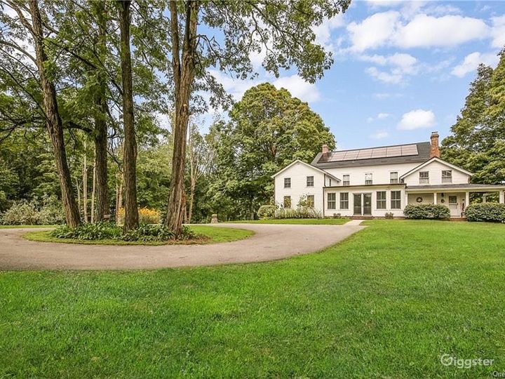 1777 built grand farmhouse, 4100 square feet main house, well set back from road. Accessed by long, circular driveway.