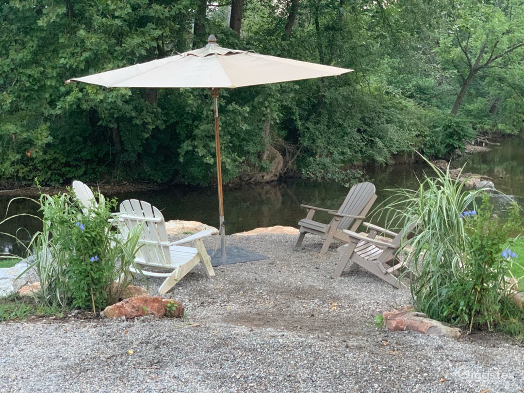 River side veranda with lounge chairs, and optional fire pit. 