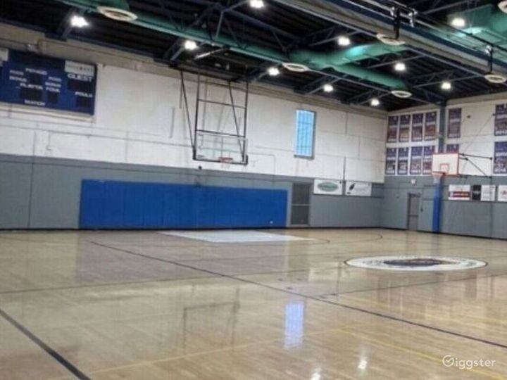 Spacious Indoor School Basketball Court Photo 3