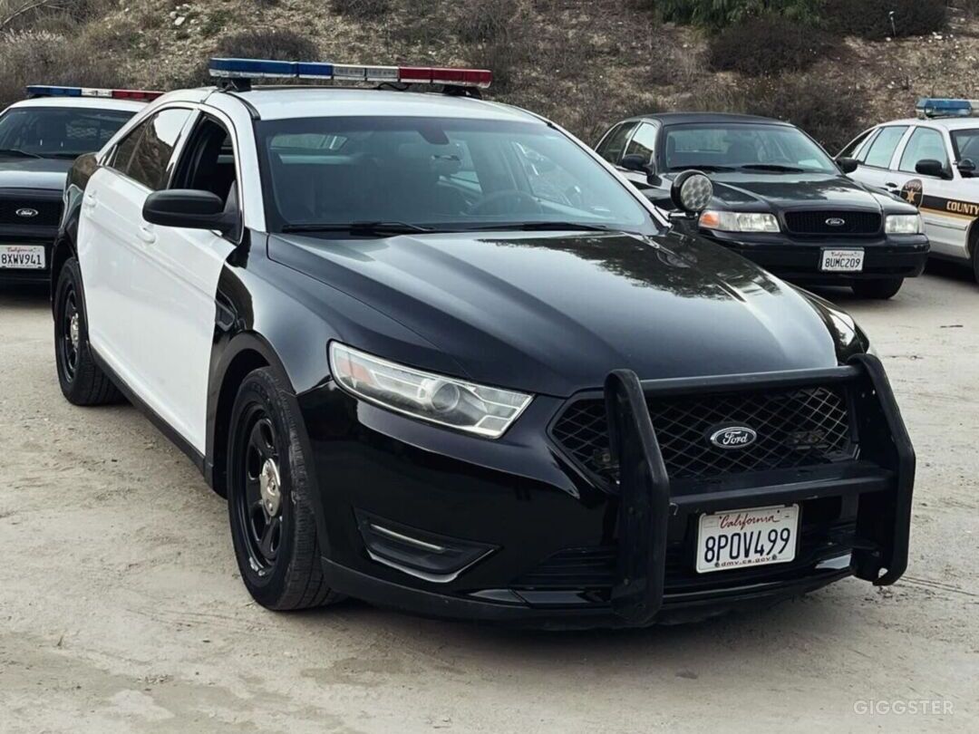 POLICE CAR: Modern Black-and-White Police Sheriff Photo 1