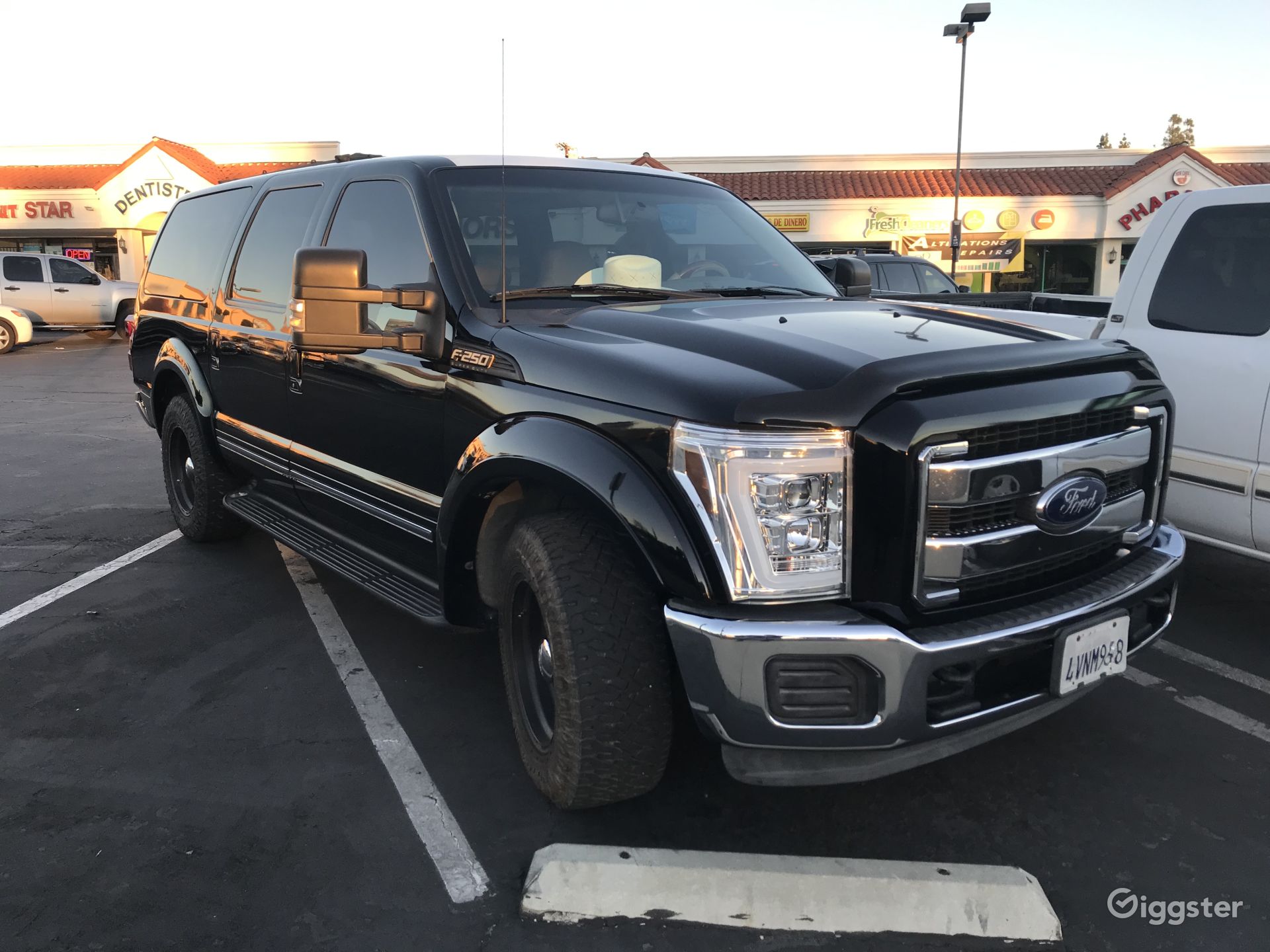 Black 2016 excursion undercover cop vehicle, Acton