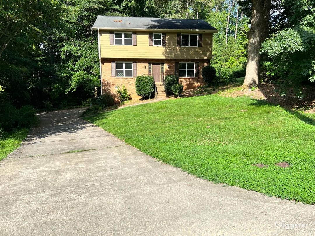 Front of Duplex with long driveway