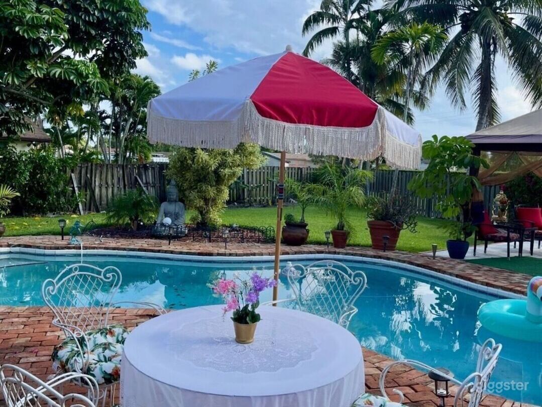  Tropical Poolside Oasis with Lush Garden Photo 2
