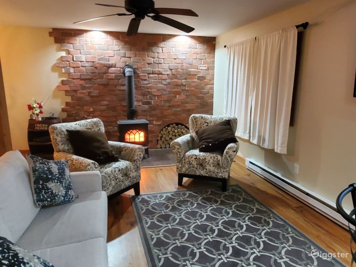 COZY SETTING NEXT TO THE FIREPLACE ! OPERATING WOOD BURNING FIREPLACE 