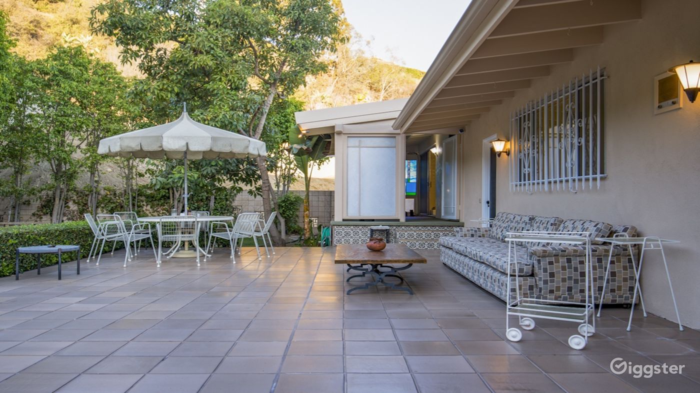 Tiled Terrace with 10'feet large 60s couch 