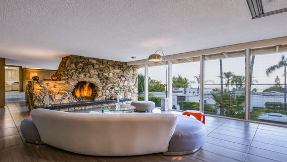 Rock Stone Fireplace as centerpiece of Living Area
