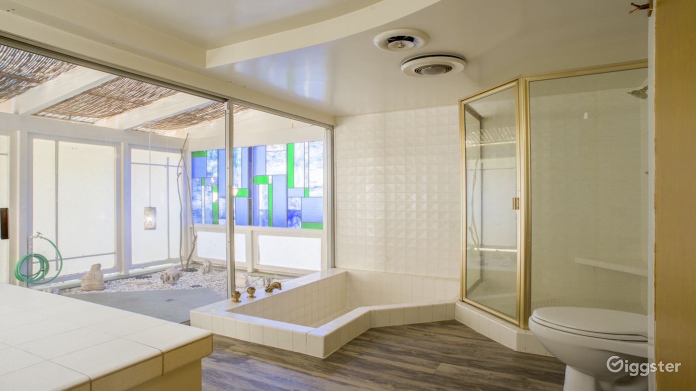 Main Master Bath area with a large sunken Bathtube