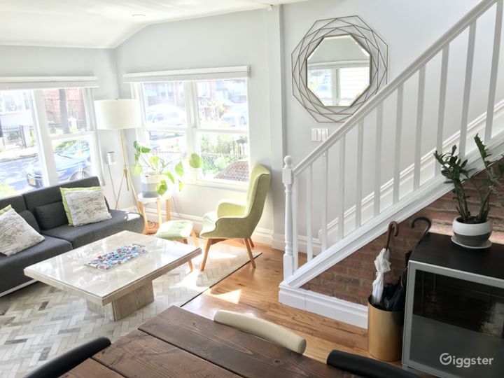 south east facing living room, stairs to bedrooms and bathroom