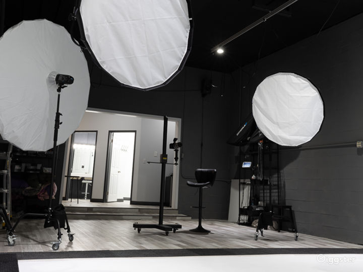 Cyclorama view of the studio including 7&#x27; umbrella and 47&quot; parabolic modifier